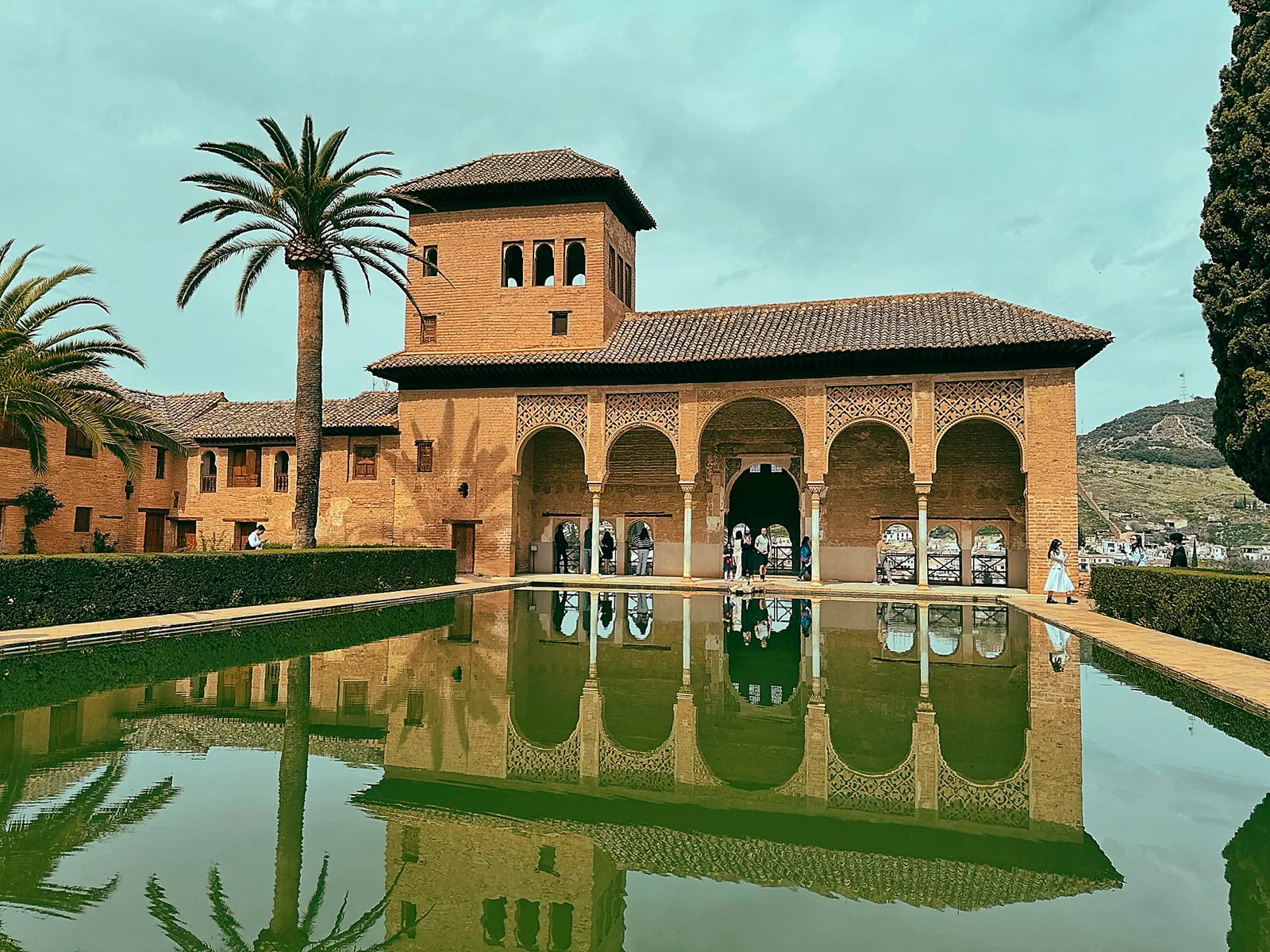 The Court of the Myrtles doubles the palace in its long reflecting pool.
