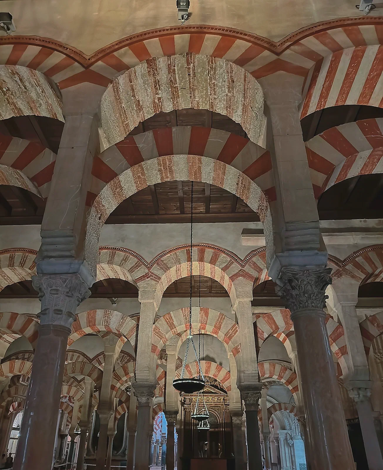 Inside Córdoba’s Mezquita, the former mosque and later cathedral occupy the same extraordinary space.