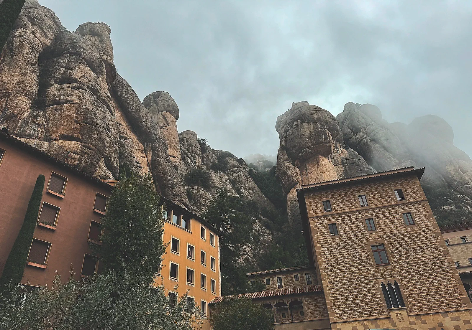 At Montserrat, the monastery seemed to float in the mist below the jagged peaks.
